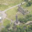 Oblique aerial view of the Calton Hill National Monument and Nelson's Monument, looking NNE.