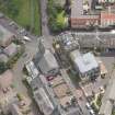 Oblique aerial view of St Thomas' Church and Leith Hospital, looking ESE.