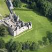 Oblique aerial view of Tolquhon Castle, looking NNE.