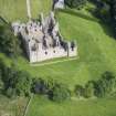 Oblique aerial view of Tolquhon Castle, looking NNW.