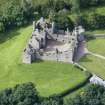 Oblique aerial view of Tolquhon Castle, looking WSW.