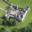 Oblique aerial view of Tolquhon Castle, looking NE.