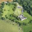 Oblique aerial view of Tolquhon Castle, looking N.