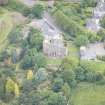 Oblique aerial view of Duddingston Parish Church, Churchyard and Watch Tower, looking NW.