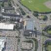 Oblique aerial view of Anniesland Court, looking SSW.