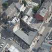 Oblique aerial view of Botanic Garden Garage and Hillhead Salon Cinema, looking E.