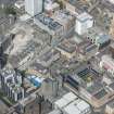 Oblique aerial view of Dalmore House, Holland Street, St Matthew's Blythswood Church and Elmbank Street, looking NW.
