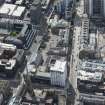 Oblique aerial view of Dalmore House, Holland Street, St Matthew's Blythswood Church and Elmbank Street, looking SSE.