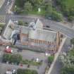 Oblique aerial view of Barony Parish Church and Statue of King William III, looking E.