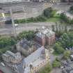 Oblique aerial view of St Mungo's Roman Catholic Church and Martyrs' Public School, looking ESE.