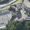 Oblique aerial view centred on the main entrance to Edinburgh Castle, looking S.