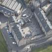 Oblique aerial view of Edinburgh Castle centred on the National War Museum of Scotland,  looking E.