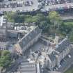 Oblique aerial view of Edinburgh Castle centred on the National War Musuem of Scotland,  looking S.