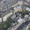 Oblique aerial view of the High Street, Trinity College Church and John Knox's House, looking NNE.