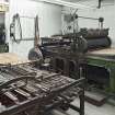 Paper folding machine and large printing press