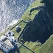 Oblique aerial view of Barra Head Lighthouse and the possible dun, looking WSW.