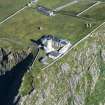 Oblique aerial view of Barra Head Lighthouse and the possible dun, looking NE.