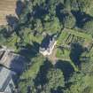 Oblique aerial view of Auchanachie Castle, looking N.