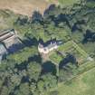 Oblique aerial view of Auchanachie Castle, looking NW.