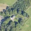 Oblique aerial view of Auchanachie Castle, looking NW.