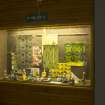 C Block first floor. Detail of display cabinet beside central stair.
