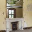 First floor Detail of fireplace and mirror above in the drawing room.