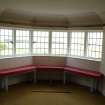 West wall of first floor bedroom 2, showing bay window and seating, photograph from a historic building appraisal at Muirfield Gate, Duncur Road, Gullane