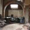 Internal view of gatehouse to former stable yards, showing archway, high-level window and later lean-to structure, photograph from a historic building appraisal at Muirfield Gate, Duncur Road, Gullane