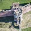 Oblique aerial view of the Mid Tower at Tantallon Castle, looking NE.