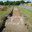 Trench 1 - Trench shot facing east, photograph from final report on an archaeological evaluation at Main Street, Bridgeton