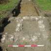 Trench 1 - Stone foundations, photograph from final report on an archaeological evaluation at Main Street, Bridgeton