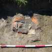 Trench 1 - Red brick feature, photograph from final report on an archaeological evaluation at Main Street, Bridgeton