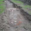 Trench 3 - Sandstone foundations, photograph from final report on an archaeological evaluation at Main Street, Bridgeton