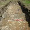 Trench 4 - Wall remains, photograph from final report on an archaeological evaluation at Main Street, Bridgeton