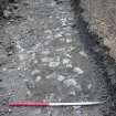 View of part of cobbled surface, photograph from final report on an archaeological evaluation at Main Street, Bridgeton