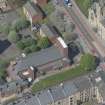Oblique aerial view of St Columbkille's Roman Catholic Church and Rutherglen Town Hall, looking WNW.