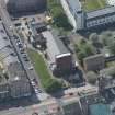 Oblique aerial view of St Columbkille's Roman Catholic Church and Rutherglen Town Hall, looking SSW.
