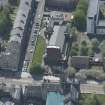 Oblique aerial view of St Columbkille's Roman Catholic Church and Rutherglen Town Hall, looking S.