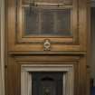 Ground floor. Trophy room. Detail of fireplace and WWI memorial.