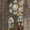 Detail of high window on east wall depicting St Luke and St Paul.
