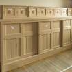 Detail of storage cupboards in main hall.