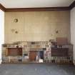Interior. North Range. 3rd Floor Managers Flat. Former Drying Room. Circa 1970s fake stone fireplace and geometric wallpaper.