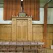 Detail of panelled wall at east end of hall.
