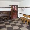 General view of session room with door open.