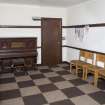 General view of session room with door closed.