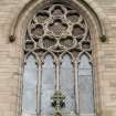 Detail of window and cross above main entrance.