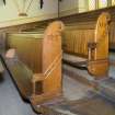 Detail of pews in gallery.