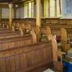 General view of front of pews.