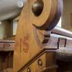 Detail of end of pew.