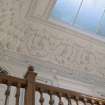 2nd floor. Stair hall, detail of plaster work below cupola.